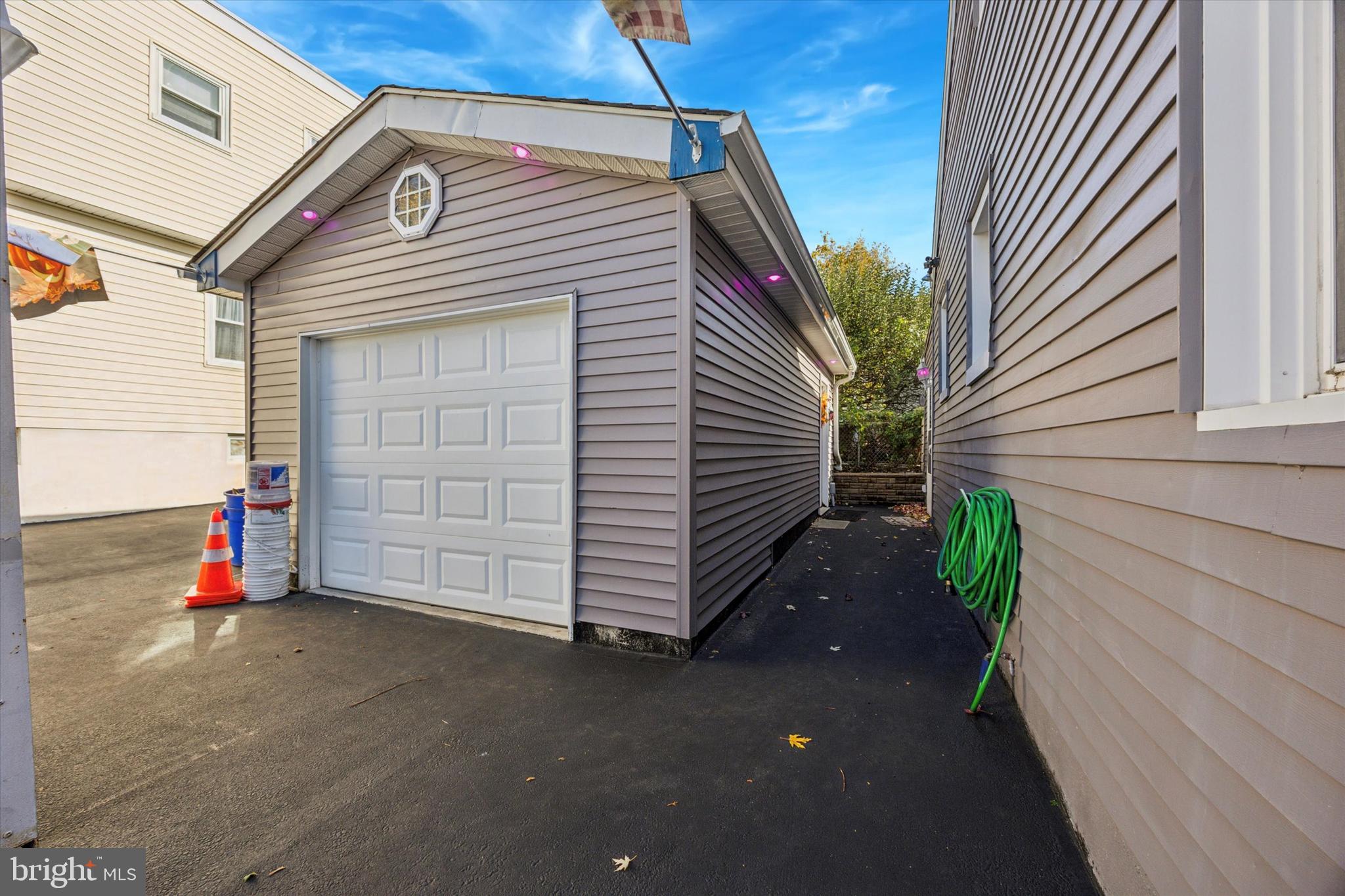4410 School Lane Drexel Hill, PA 19026 - Photo 25 of 27 a view of a house with a garage