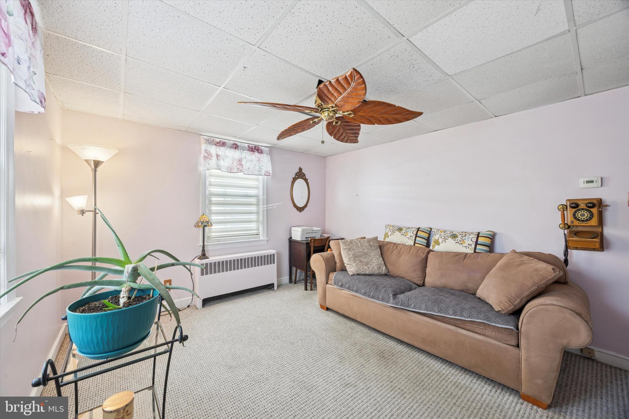 4410 School Lane Drexel Hill, PA 19026 - Photo 10 of 27 a living room with furniture and a rug