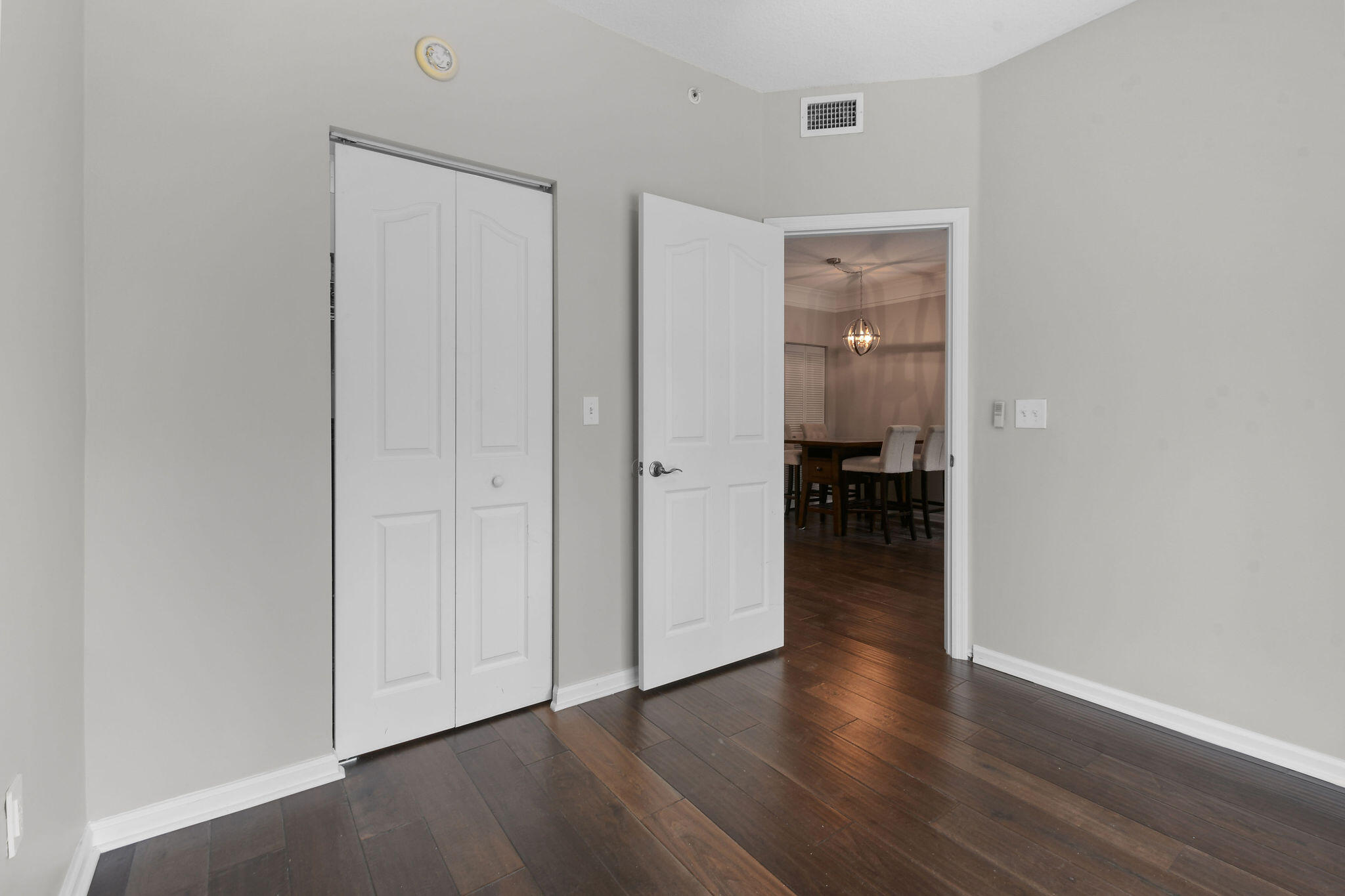 175 Galicia Way, Unit 211 Jupiter, FL 33458 - Photo 15 of 49 a view of a hallway with wooden floor and closet