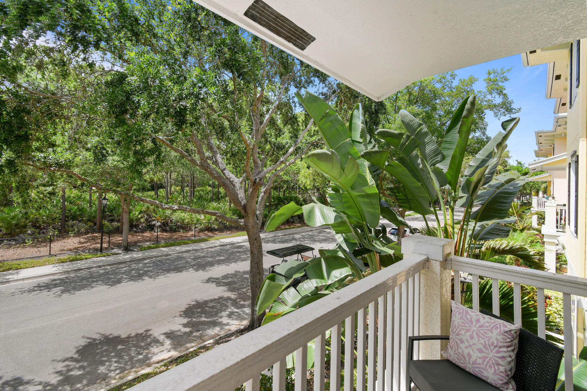175 Galicia Way, Unit 211 Jupiter, FL 33458 - Photo 18 of 49 a view of a garden from a balcony