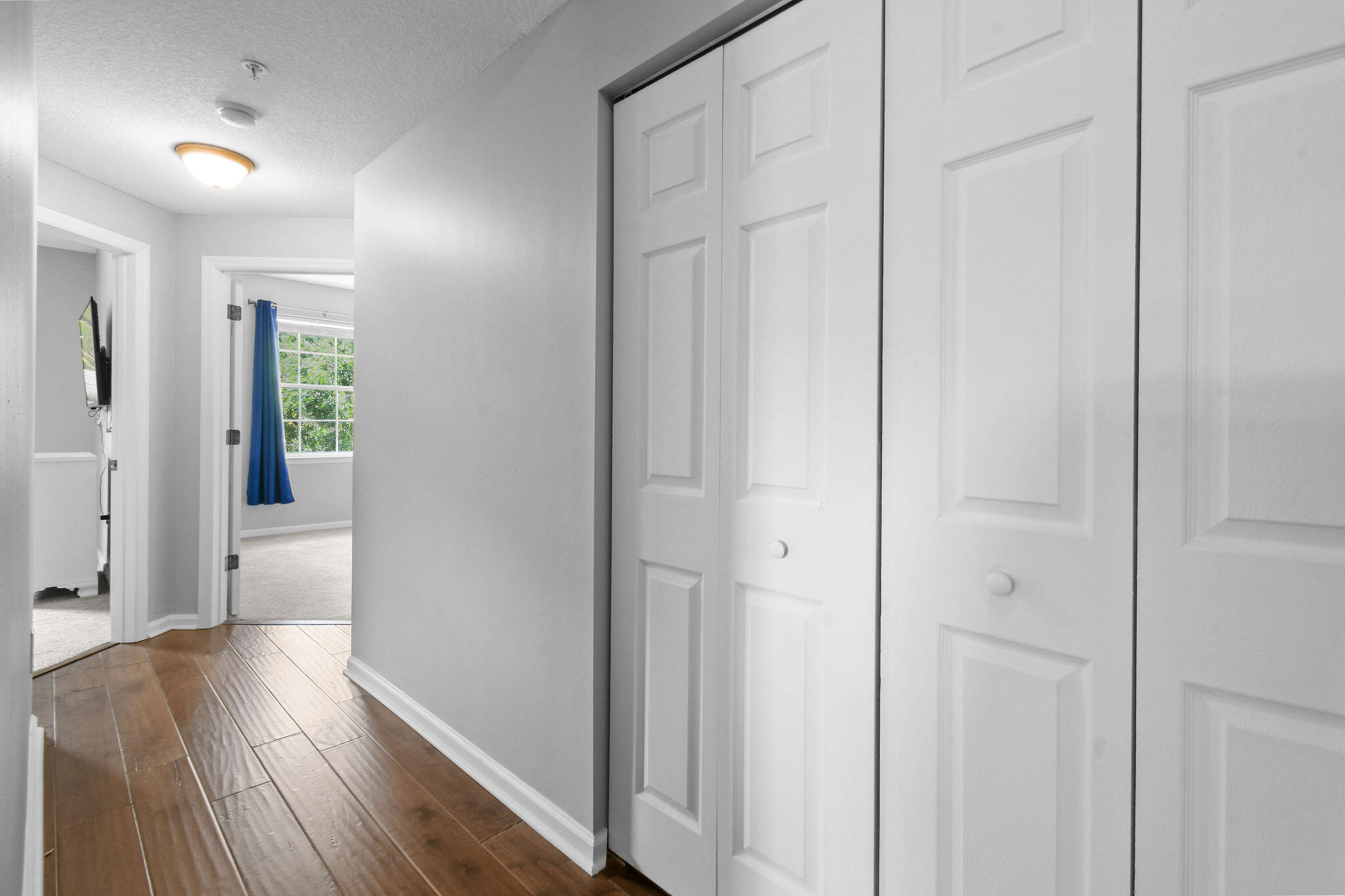 175 Galicia Way, Unit 211 Jupiter, FL 33458 - Photo 19 of 49 a view of a hallway with wooden floor and closet