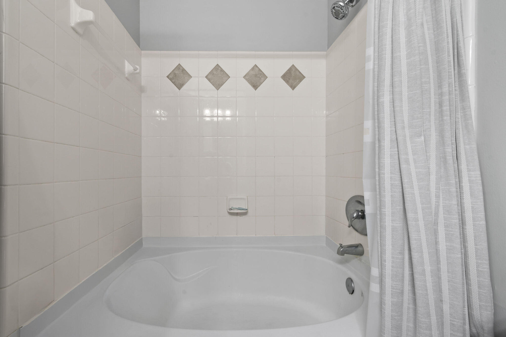 175 Galicia Way, Unit 211 Jupiter, FL 33458 - Photo 25 of 49 a close up of a bathtub in a bathroom