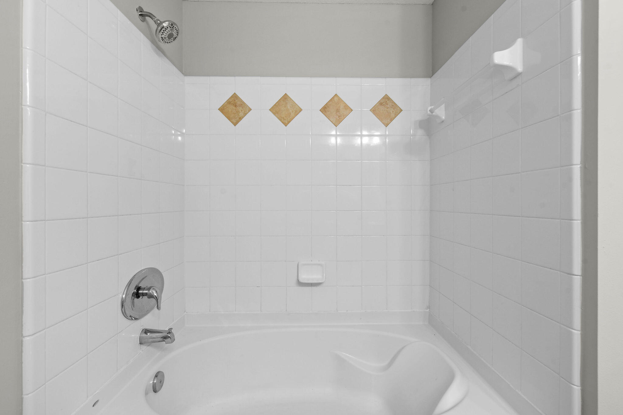 175 Galicia Way, Unit 211 Jupiter, FL 33458 - Photo 29 of 49 a bathroom with a bathtub and a shower
