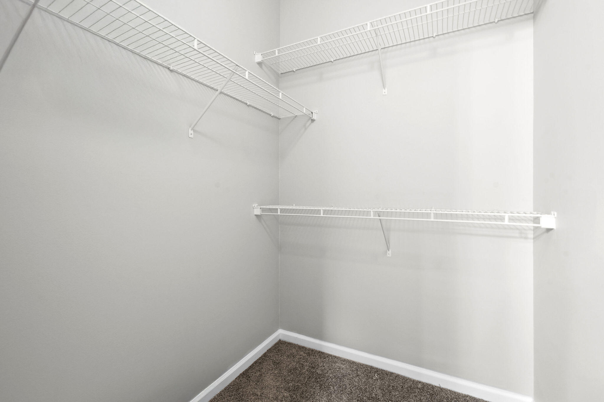 175 Galicia Way, Unit 211 Jupiter, FL 33458 - Photo 30 of 49 a view of a room with racks on the wall