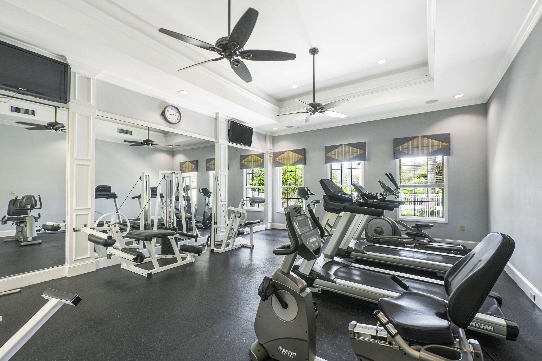 175 Galicia Way, Unit 211 Jupiter, FL 33458 - Photo 35 of 49 a view of a room with gym equipment