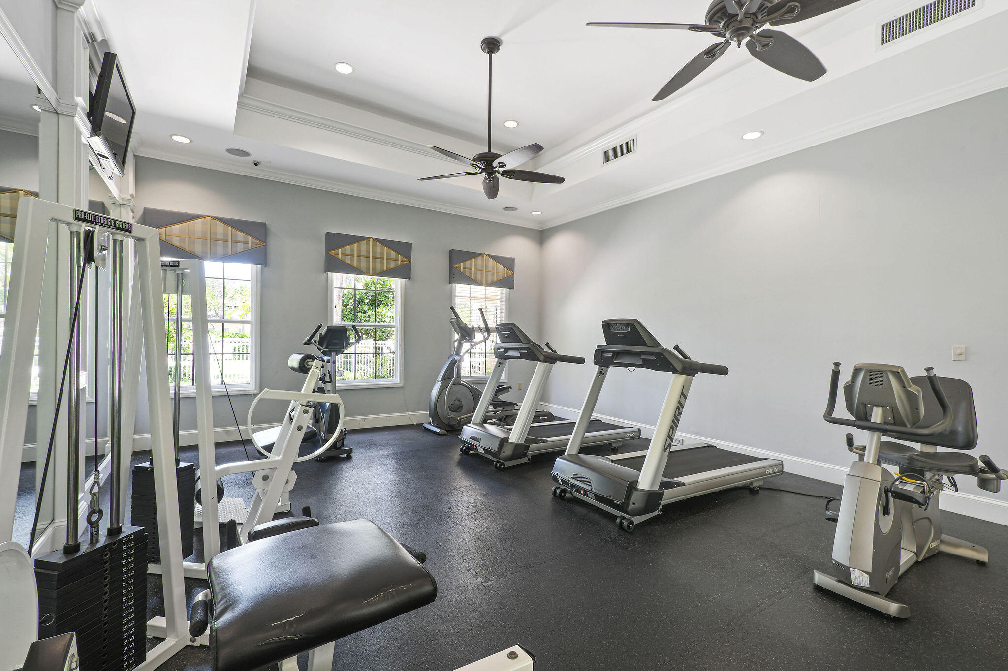 175 Galicia Way, Unit 211 Jupiter, FL 33458 - Photo 36 of 49 a view of a room with gym equipment