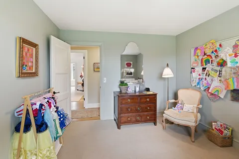a bedroom with furniture and a couch