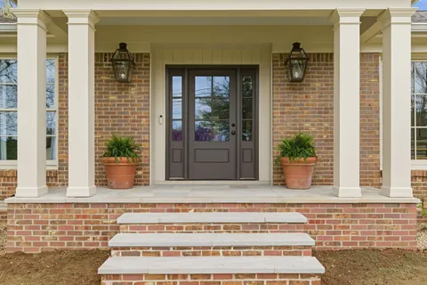 a view of a entryway door front of house