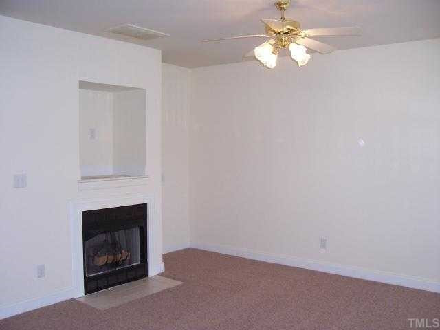 269 Dairy Road, Unit 6 Clayton, NC 27520 - Photo 4 of 12 Gas logs, ceiling fan, and 9ft ceilings. New Carpet and paint. Den/Family/Great Room