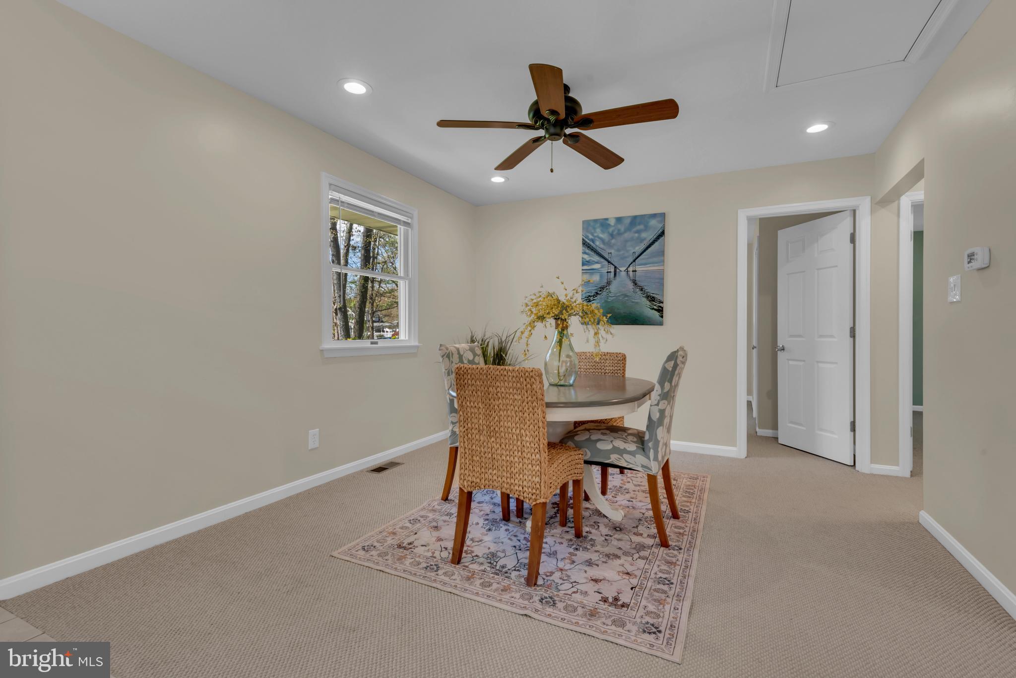 320 McKay Road Stevensville, MD 21666 - Photo 14 of 48 a dining room with furniture and window