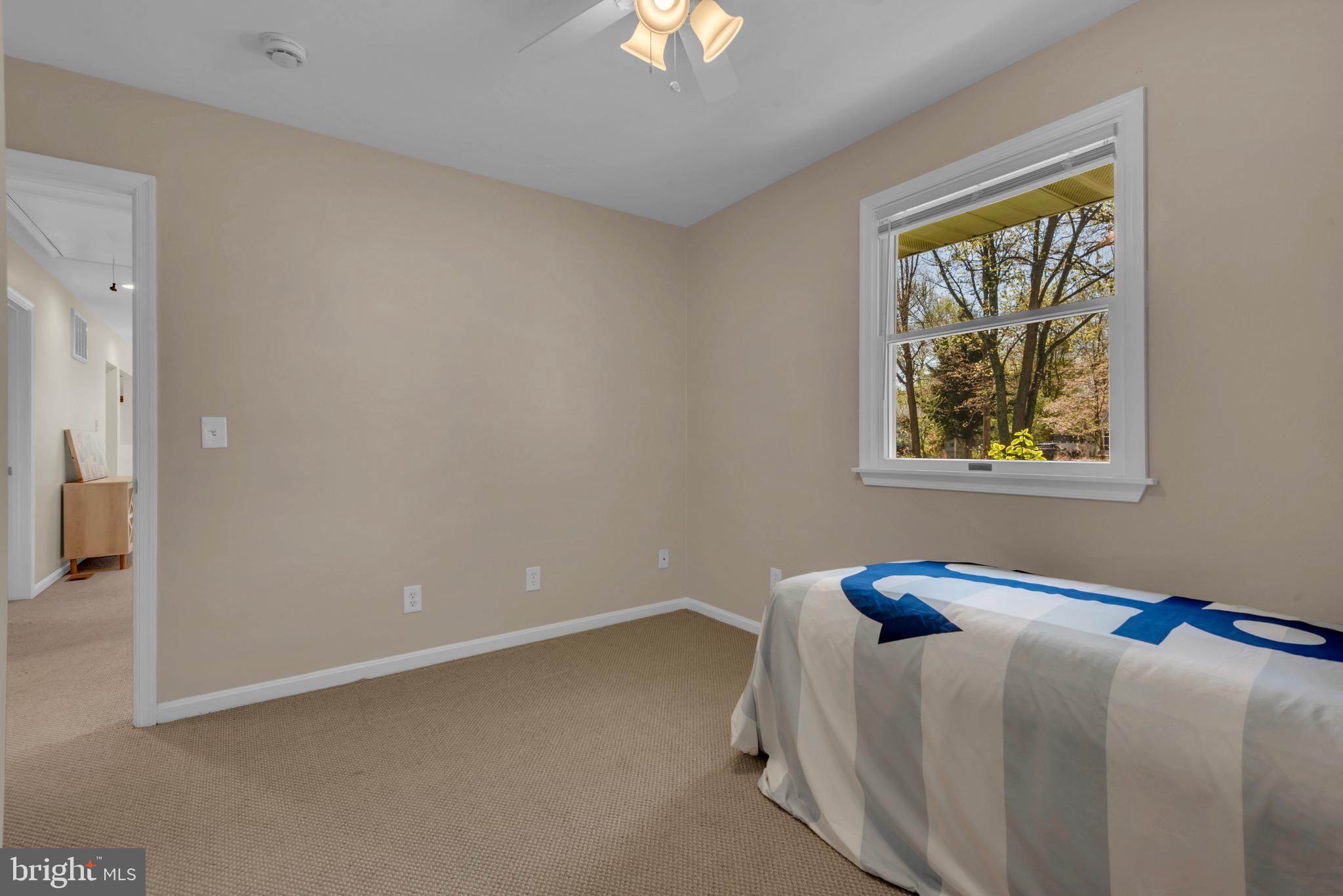 320 McKay Road Stevensville, MD 21666 - Photo 28 of 48 a bedroom with bed and a window