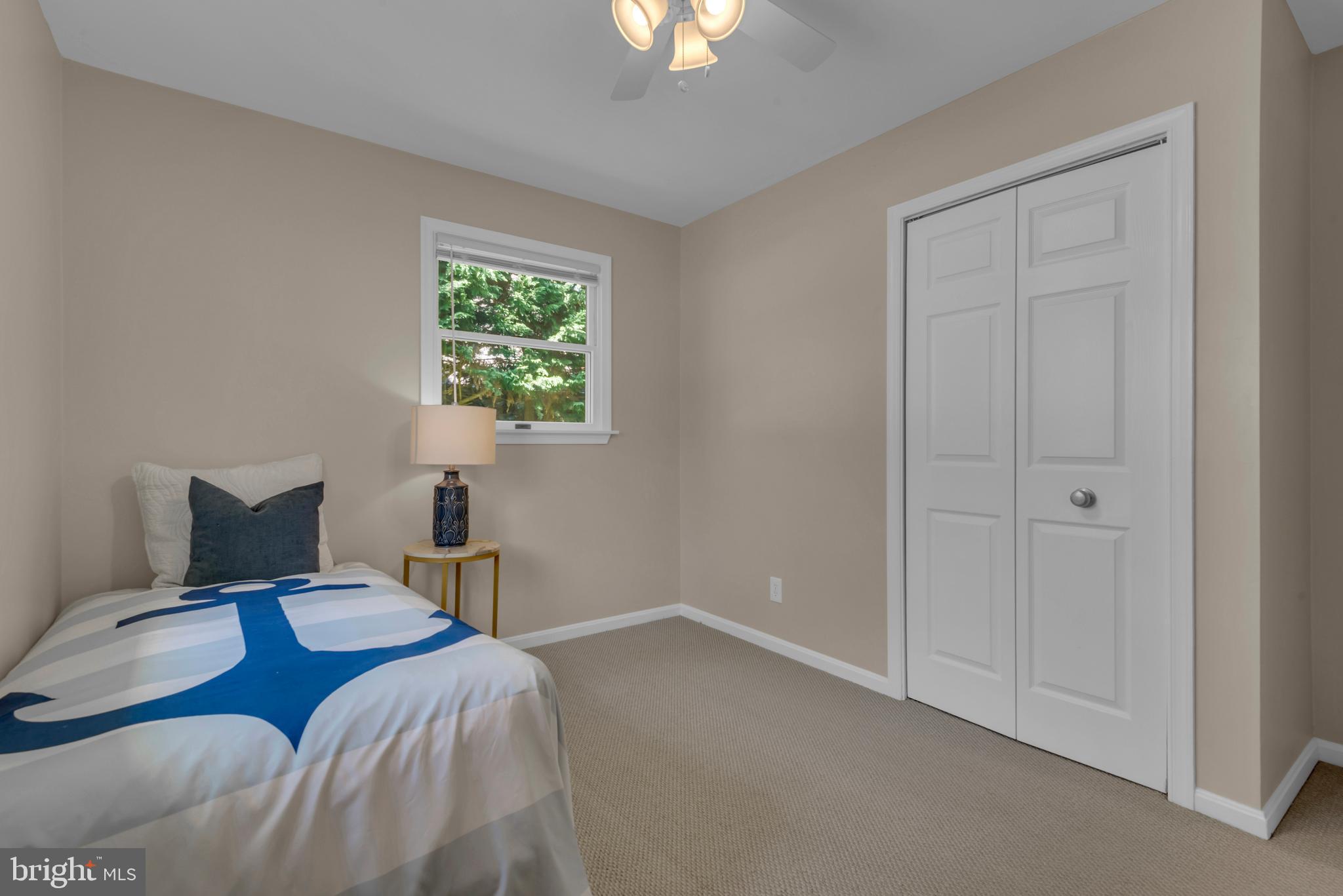 320 McKay Road Stevensville, MD 21666 - Photo 29 of 48 a bedroom with a bed and a window