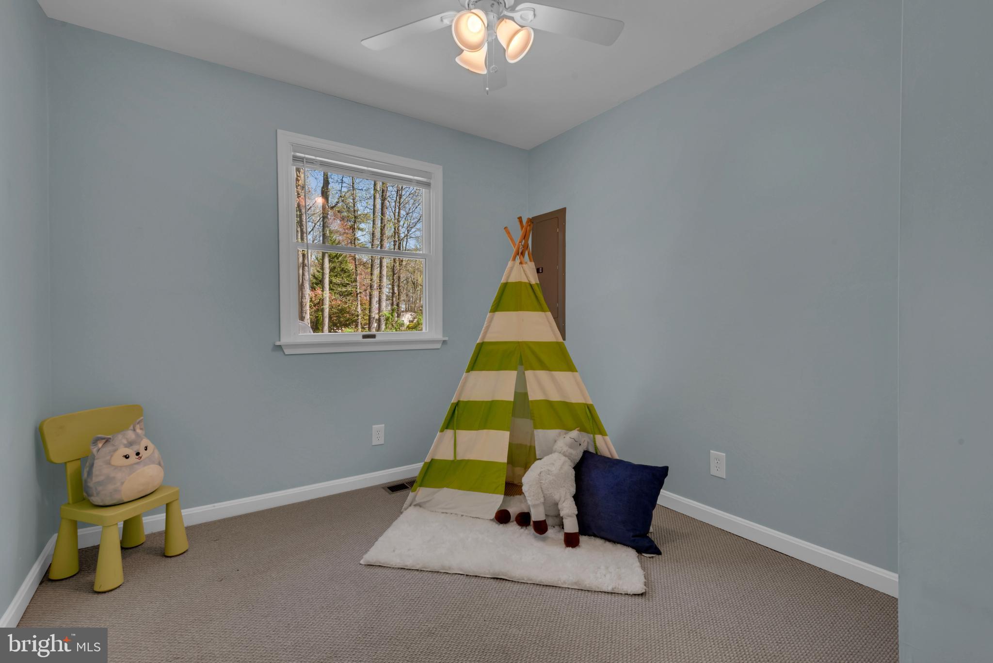 320 McKay Road Stevensville, MD 21666 - Photo 30 of 48 a room that has a bed and a window