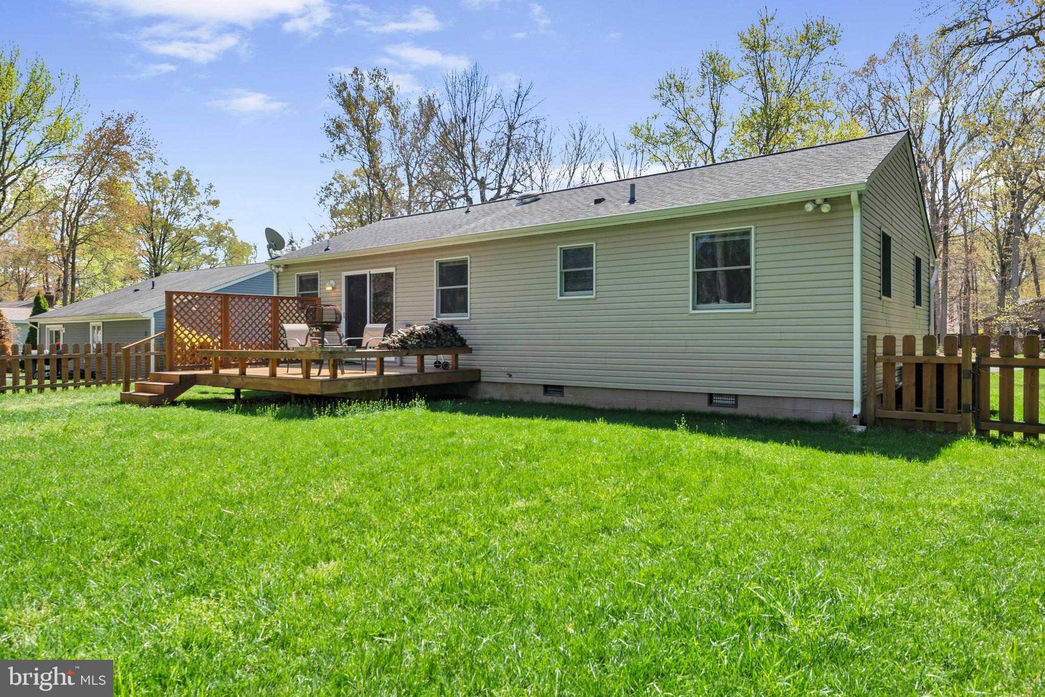 320 McKay Road Stevensville, MD 21666 - Photo 38 of 48 a view of a house with backyard and sitting area