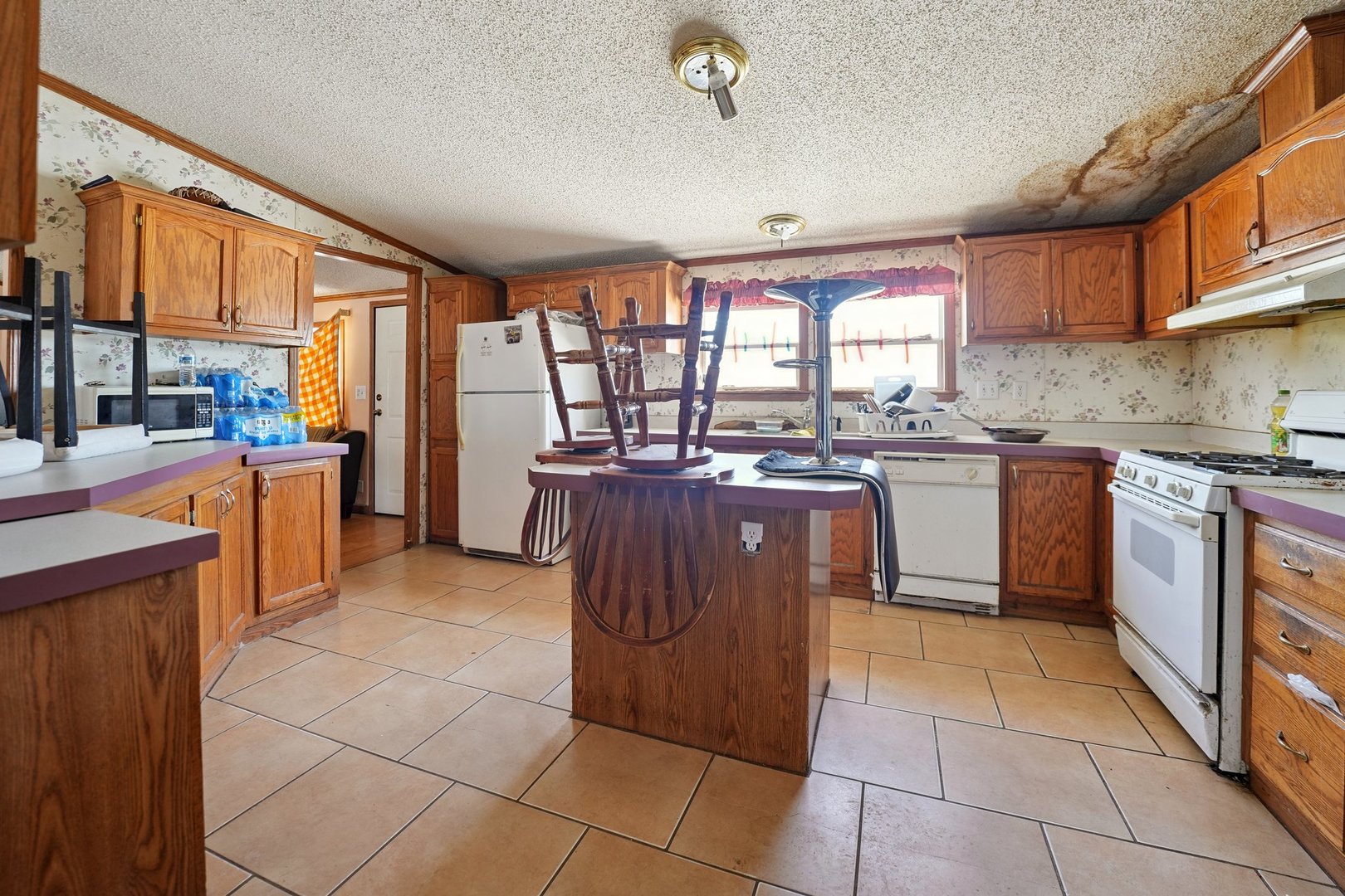 30048 South Klemme Road Beecher, IL 60401 - Photo 15 of 28 a kitchen with a stove sink and cabinets