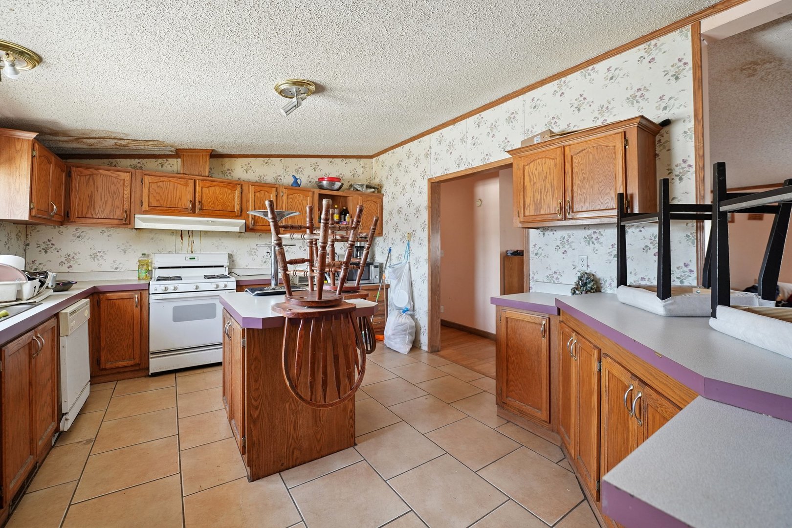 30048 South Klemme Road Beecher, IL 60401 - Photo 16 of 28 a kitchen with a sink counter top space appliances and a window