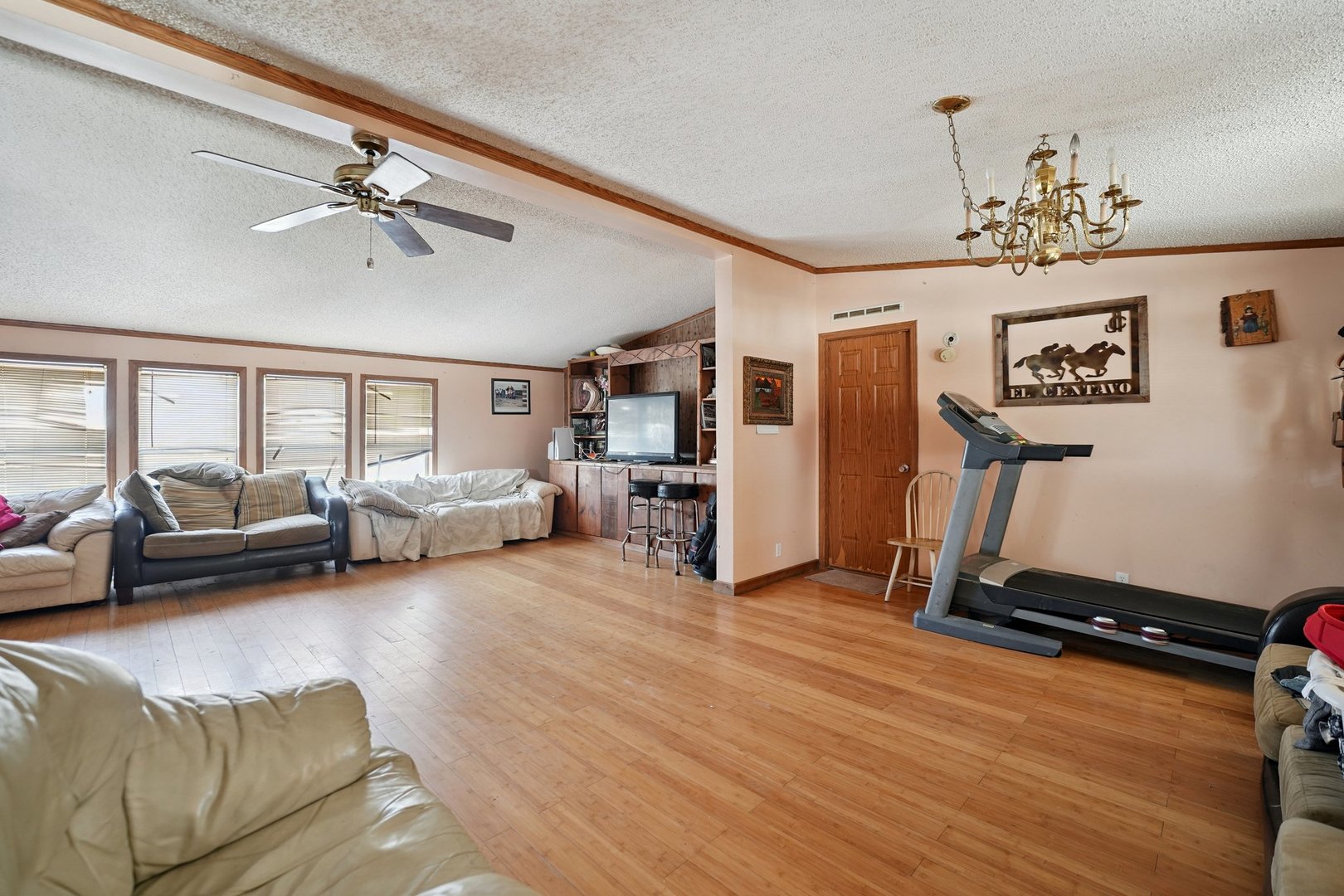 30048 South Klemme Road Beecher, IL 60401 - Photo 17 of 28 a living room with furniture gym equipment and a window