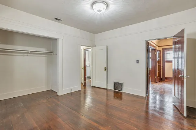 a view of livingroom with hardwood floor and hallway