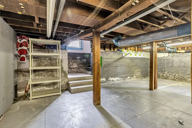 a view of an empty room with a balcony