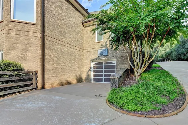 a bathroom with a double vanity sink mirror and bathtub