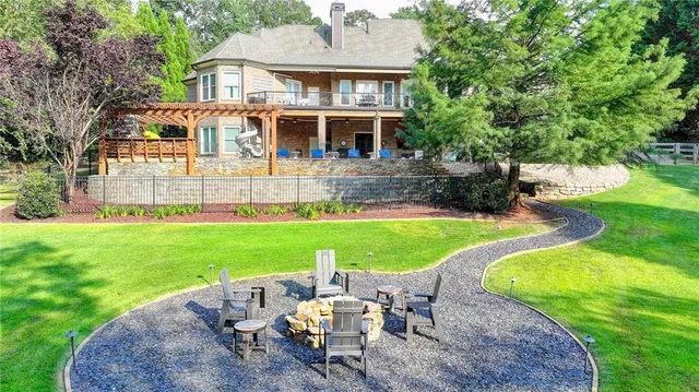 a kitchen with granite countertop stainless steel appliances sink and cabinets