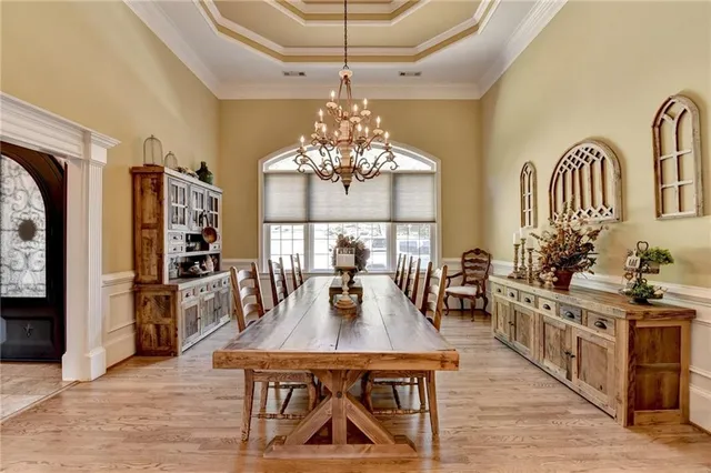 a lobby with furniture and flat screen tv