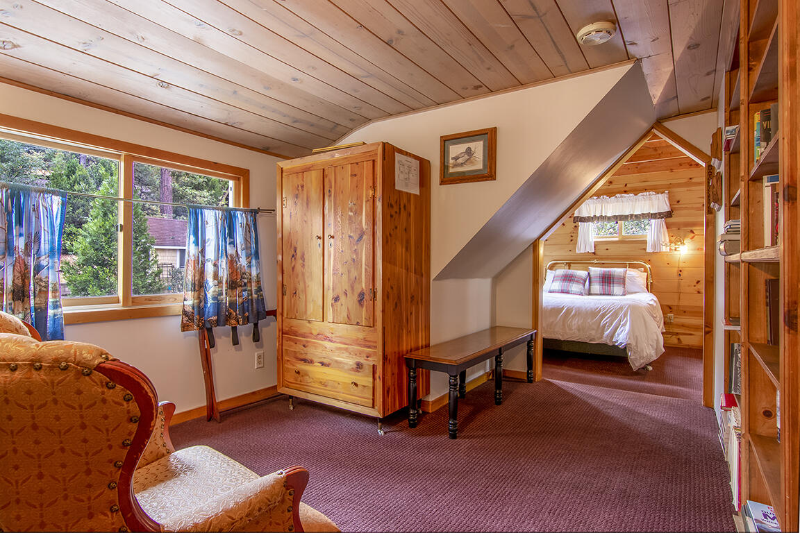 26770 Idyllwild Road Idyllwild, CA 92549 - Photo 20 of 52 a bedroom with furniture and a window