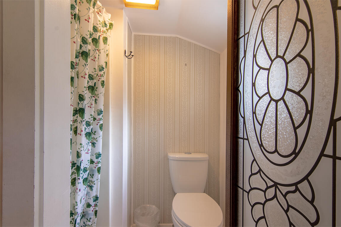 26770 Idyllwild Road Idyllwild, CA 92549 - Photo 21 of 52 a bathroom with a toilet and a sink