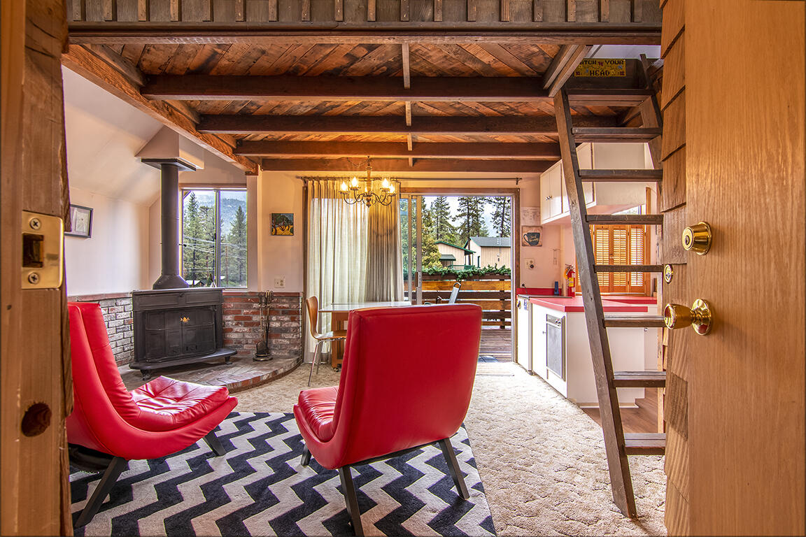 26770 Idyllwild Road Idyllwild, CA 92549 - Photo 26 of 52 a living room with furniture and a window