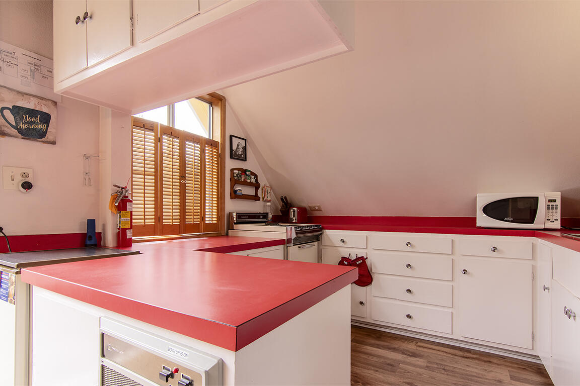 26770 Idyllwild Road Idyllwild, CA 92549 - Photo 29 of 52 a room with a table and a window