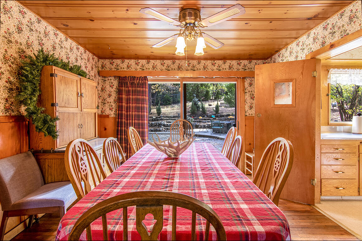 26770 Idyllwild Road Idyllwild, CA 92549 - Photo 4 of 52 a bedroom with a bed and wooden floor