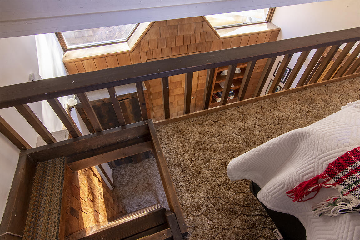 26770 Idyllwild Road Idyllwild, CA 92549 - Photo 40 of 52 a view of wooden floor with a chair