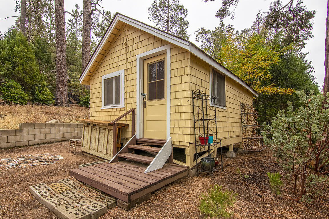 26770 Idyllwild Road Idyllwild, CA 92549 - Photo 49 of 52 a view of a house with backyard and trees