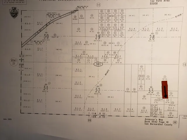 a view of a backyard of the house