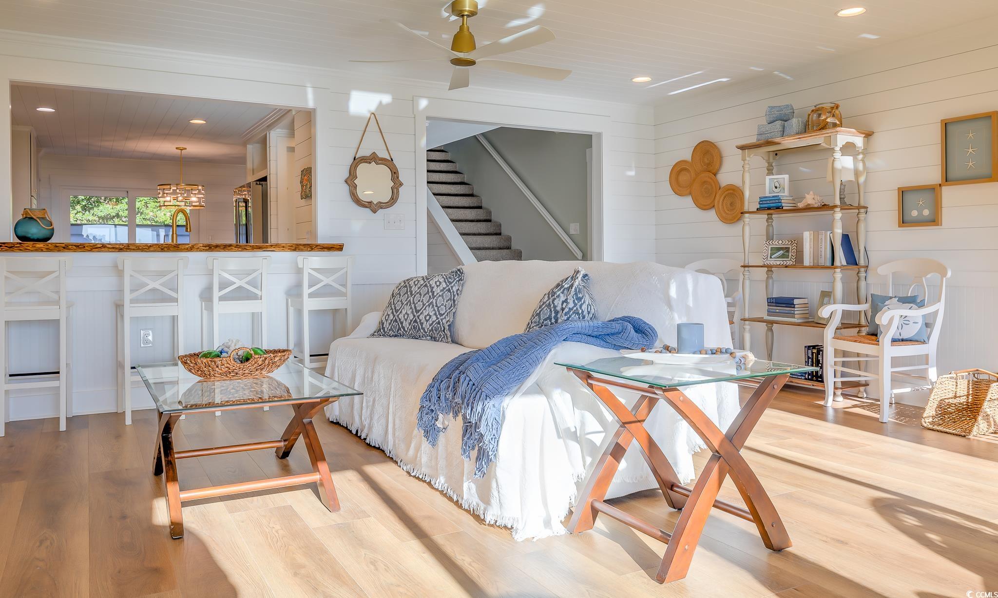 204 Bamboo Loop, Unit 202 Georgetown, SC 29440 - Photo 21 of 40 Living room with recessed lighting, stairway, wood finished floors, a chandelier, and ceiling fan