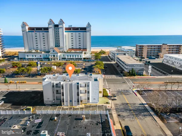 a view of a city with an ocean view