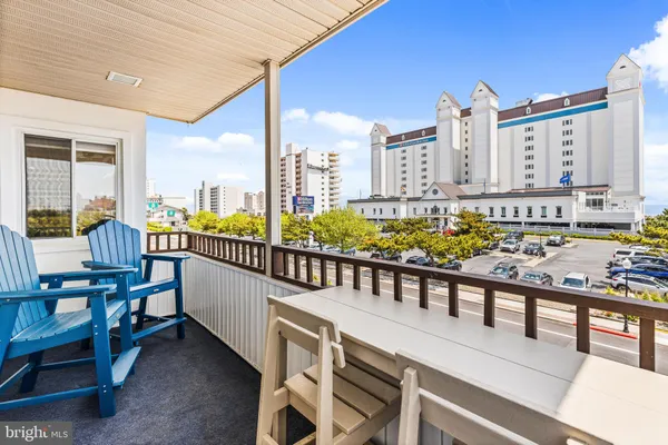 a view of a balcony with city view