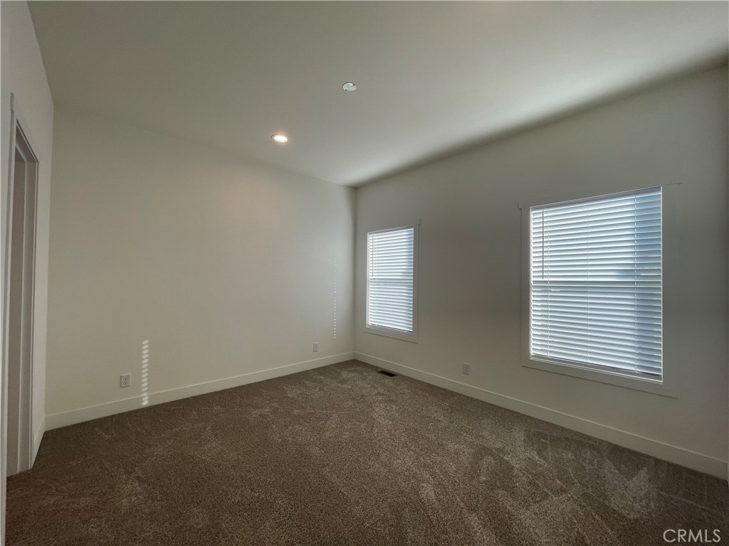 12995 6th Street, Unit 9 Yucaipa, CA 92399 - Photo 28 of 32 an empty room with a window