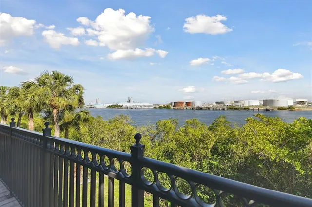a view of a lake from a balcony