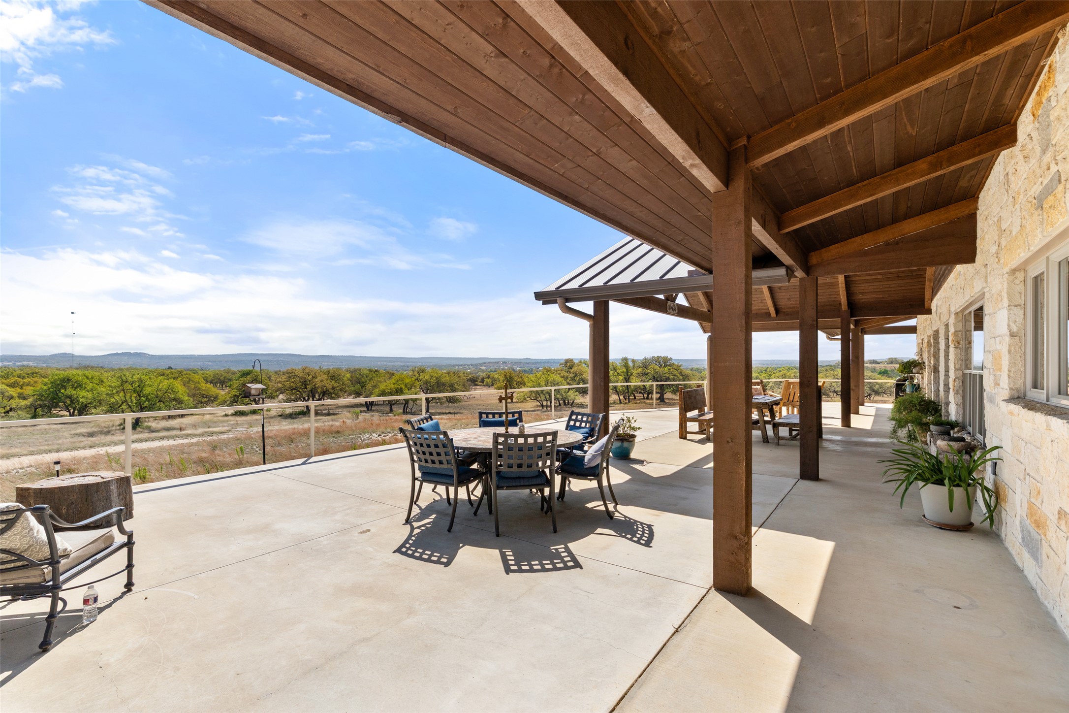 546 Lazy Oak Road Hye, TX 78635 - Photo 13 of 34 a view of a patio with swimming pool and furniture