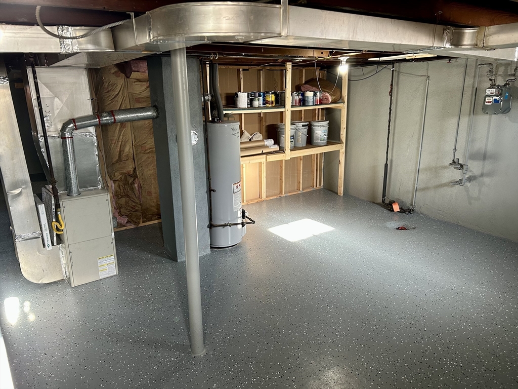 42 Talmadge Drive Springfield, MA 01118 - Photo 17 of 21 a view of water heater room with an empty room