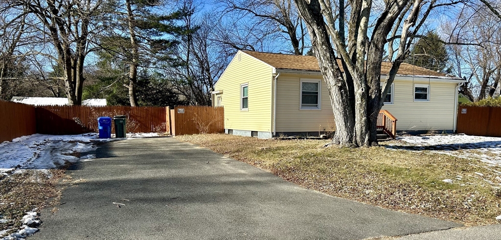 42 Talmadge Drive Springfield, MA 01118 - Photo 18 of 21 a view of a backyard with a tree