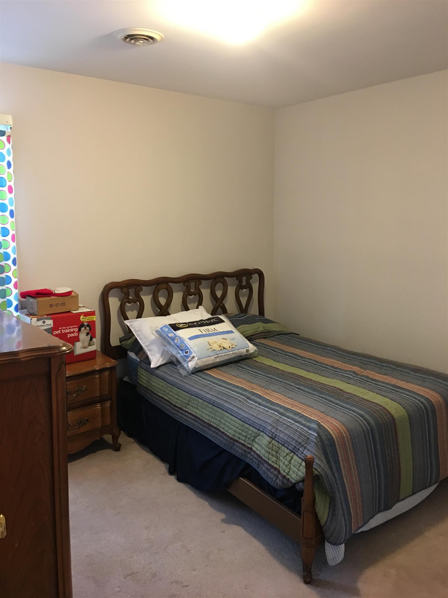 1241 Cheyenne Boulevard Madison, TN 37115 - Photo 16 of 16 a bedroom with a bed and dresser