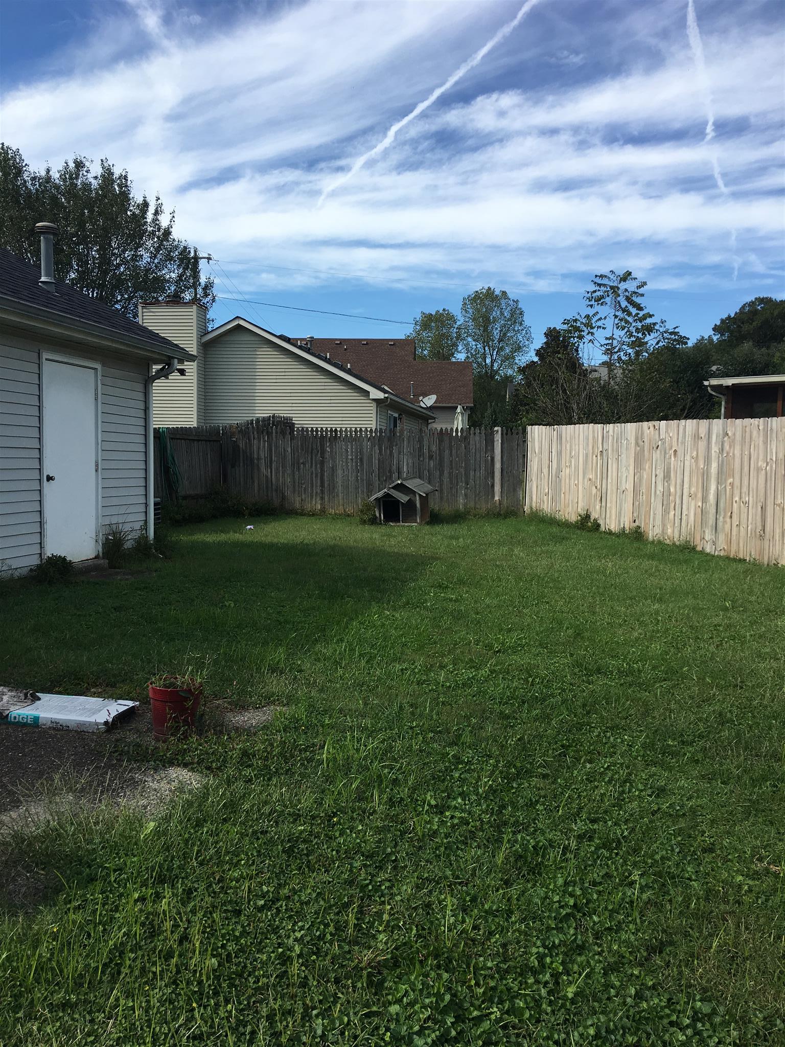 1241 Cheyenne Boulevard Madison, TN 37115 - Photo 2 of 16 a view of a porch with a yard