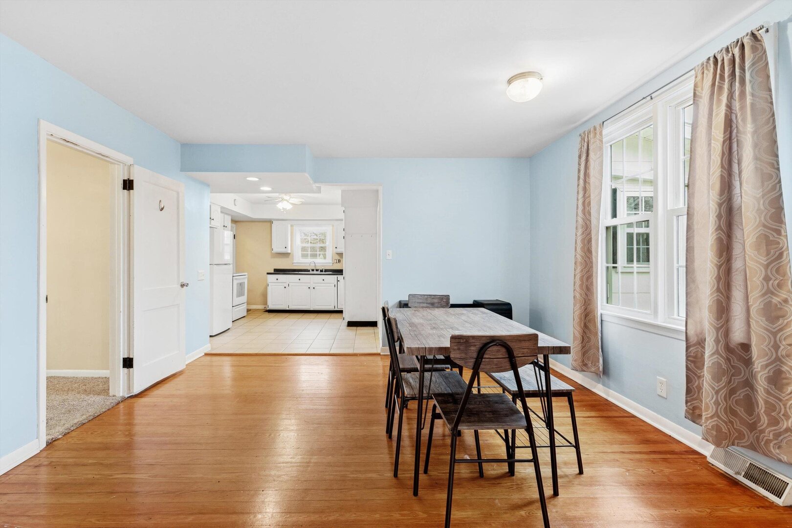 310 North Scott Street Alexis, IL 61412 - Photo 14 of 22 a view of a dining room with furniture and wooden floor