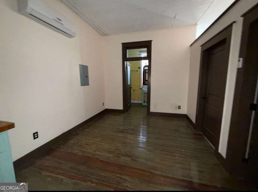 359 Railroad Street, Unit F Royston, GA 30662 - Photo 8 of 9 a view of a hallway with wooden floor
