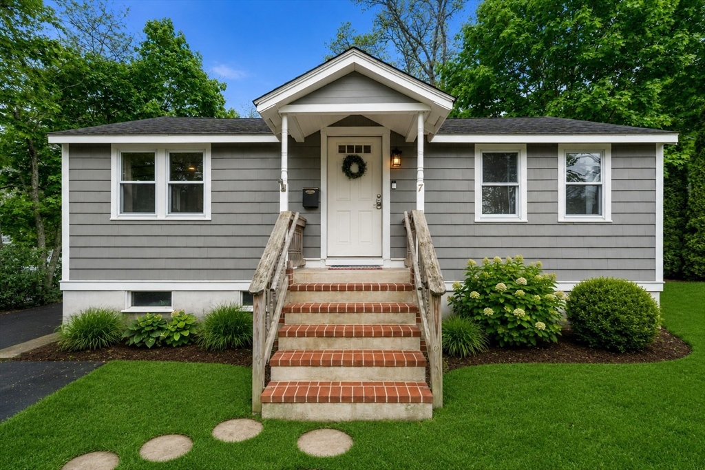 7 Indian Neck Road Wareham, MA 02571 - Photo 2 of 34 a front view of a house with a yard