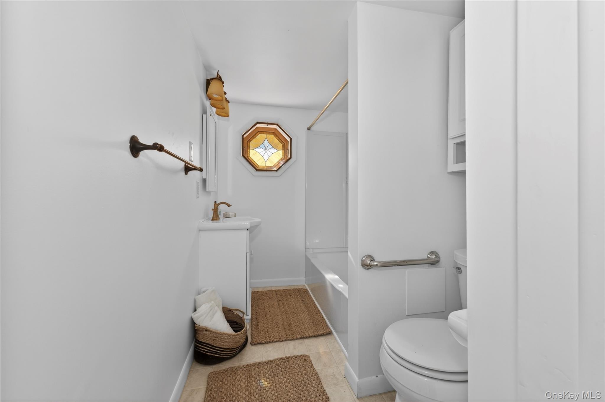 7 Highland Lake Road Eldred, NY 12732 - Photo 15 of 19 a bathroom with a toilet and a sink