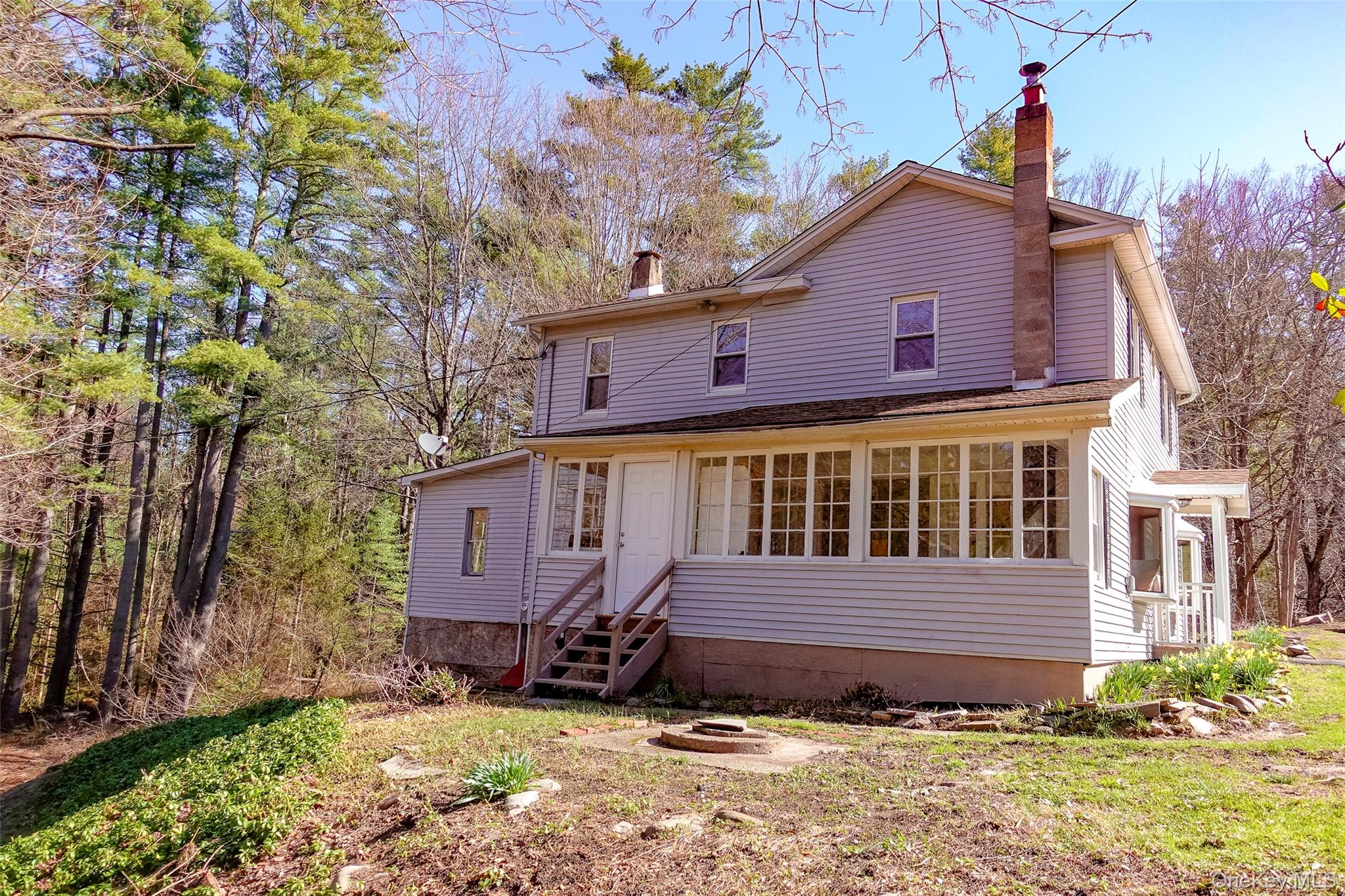 7 Highland Lake Road Eldred, NY 12732 - Photo 3 of 19 a view of a house with a yard
