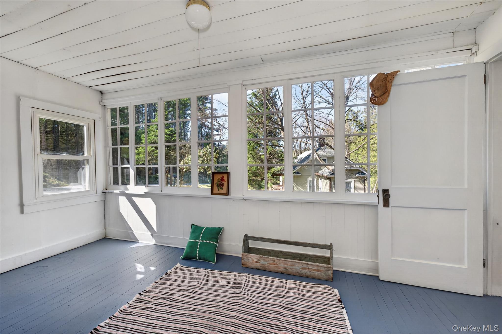 7 Highland Lake Road Eldred, NY 12732 - Photo 10 of 19 a view of a room with wooden floor and a window